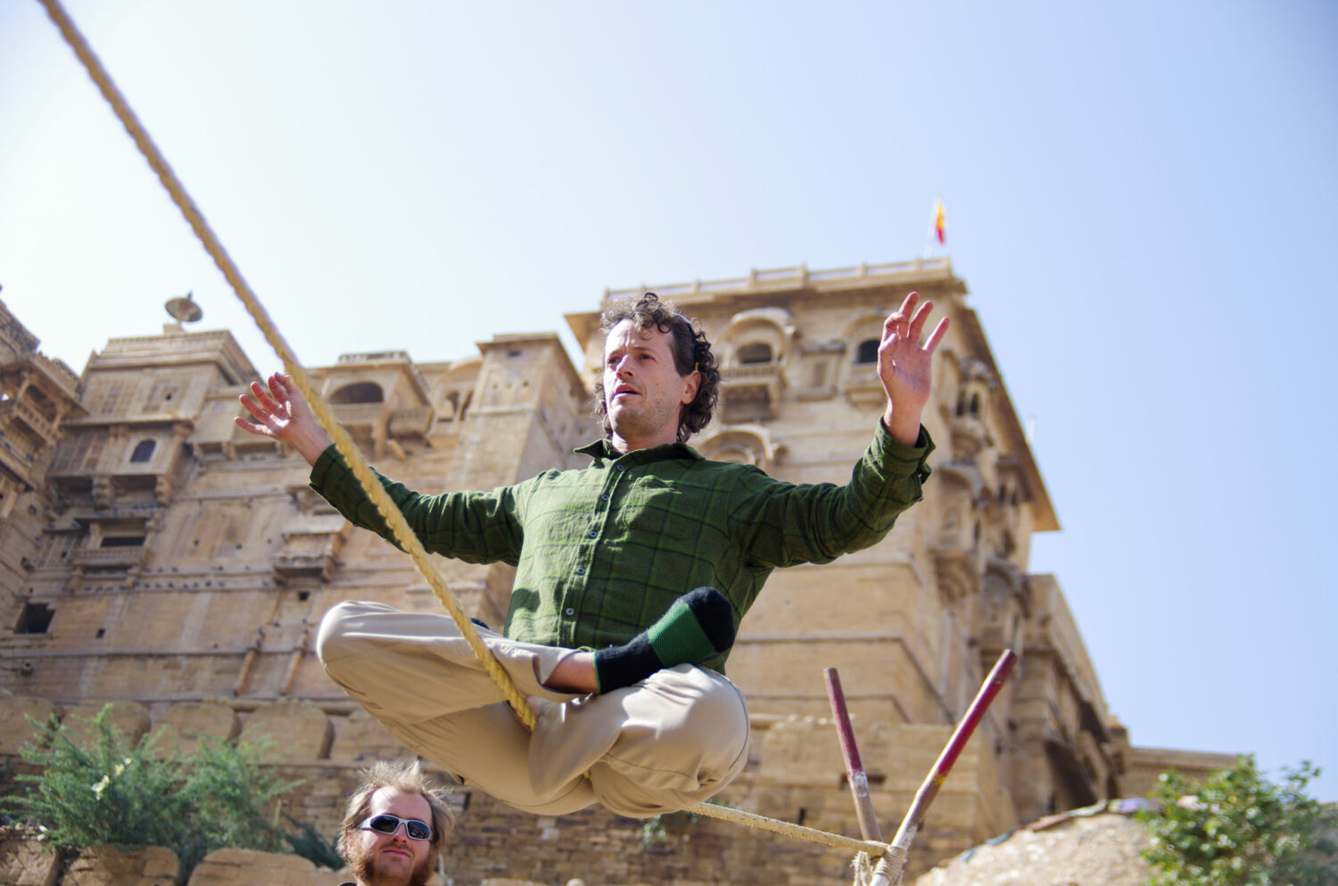 Jason Magness balancing on a slack rope